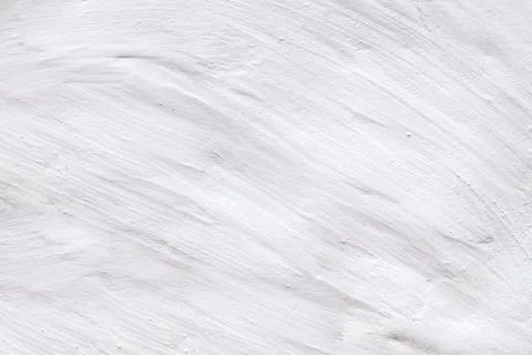 Rustic white limed wall background. Rural rough uneven texture Stock Photos