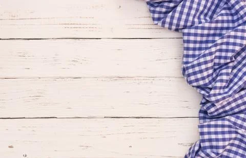 Rustic white wood table background with blue tablecloth Stock Photos