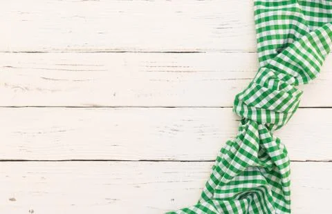Rustic white wood table background with green napkin Stock Photos