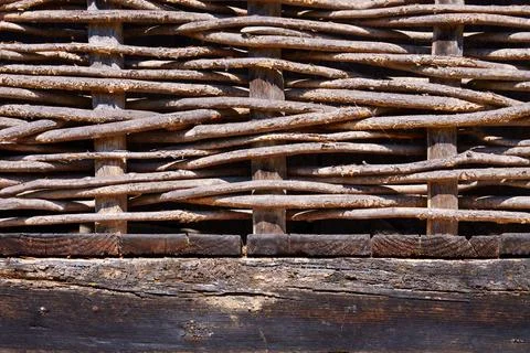 Rustic wicker fence texture background made of natural wooden twigs Stock Photos