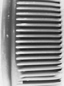 Rustic wide tooth comb texture Stock Photos