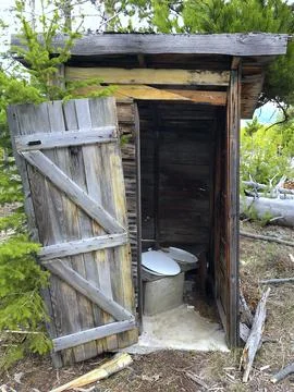 Rustic Wilderness Outhouse Stock Photos