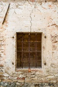 Rustic Window with Iron Bars Stock Photos