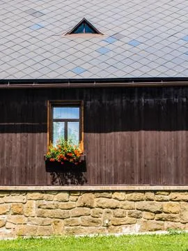 Rustic window in a mountain cottage Stock Photos