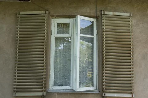 Rustic Window with Open Shutters Stock Photos