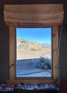Rustic window overlooking the desert Stock Photos