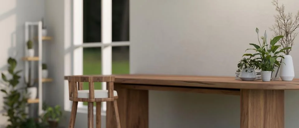 A rustic wood long table with a stool against the white wall in a contempor.. Illustrazione stock
