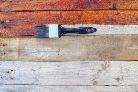 Rustic Wood Surface Restoration Coating With Paintbrush Stock Photos