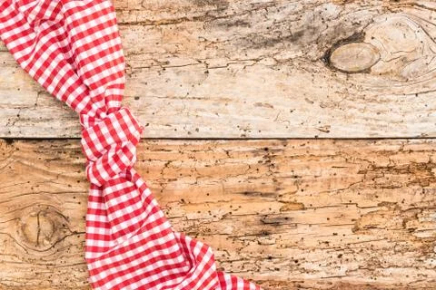 Rustic wood table background with red napkin Stock Photos