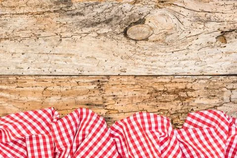 Rustic wood table background with red tablecloth Stock Photos