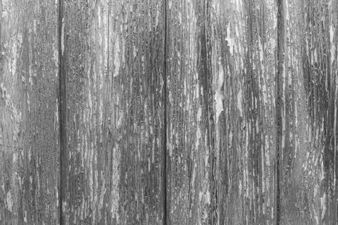 Rustic wood texture or background with scratched paint.  Monochrome. Black an Stock Photos