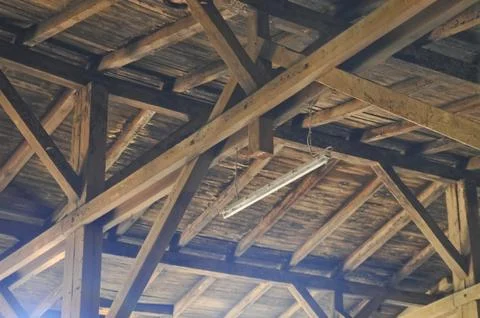 Rustic Wooden Ceiling with Hanging Light Stock Photos
