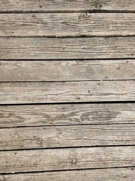 Rustic wooden deck texture with weathered planks and natural grain detail4 스톡 사진