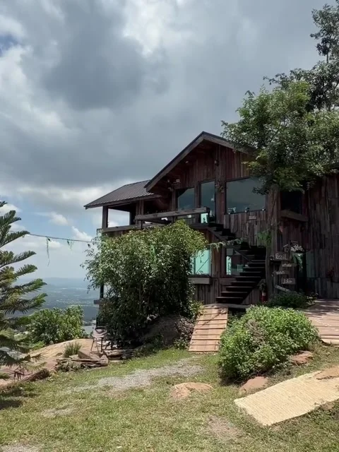 Rustic Wooden House on Mountain Hillside Stock Footage 342267641