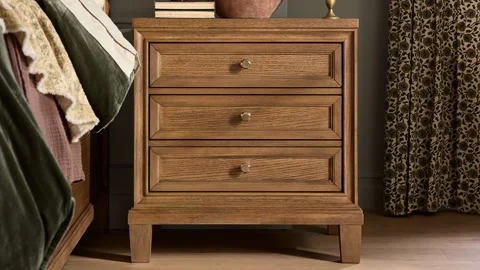 Rustic Wooden Nightstand Beside Bed in Professionally Staged Bedroom Stock Footage 340398704