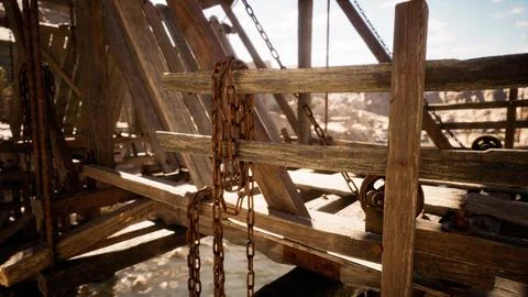 Rustic wooden structure with chains and intricate details in a canyon setting 库存插图