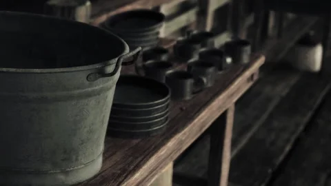 Rustic Wooden Table Adorned With Vintage Kitchenware in a Calm Setting Stock Footage 344537577