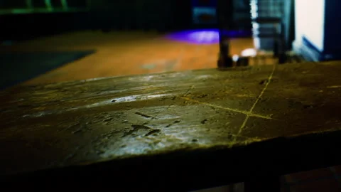 Rustic Wooden Table Close Up Showcasing Natural Texture in Low Light Stock Footage 347056749