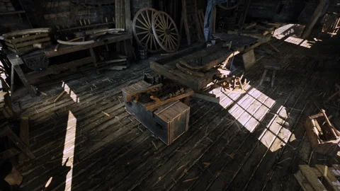 Rustic Workshop Bathed in Sunlight With Wooden Tools and Antique Furniture Stock Footage 348161454