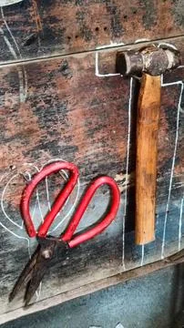 Rustic Workshop With Tools Hanging On Wooden Wall Stock Photos
