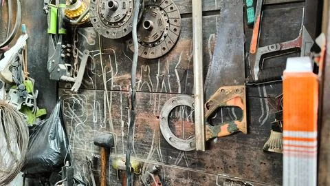 Rustic Workshop With Tools Hanging On Wooden Wall Stock Photos