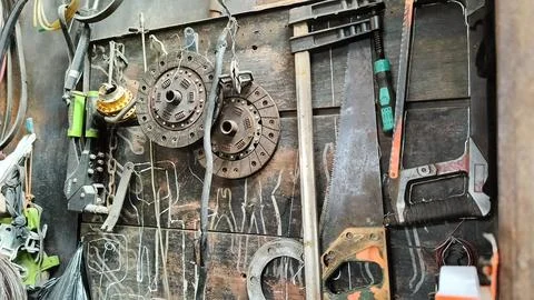 Rustic Workshop With Tools Hanging On Wooden Wall Stock Photos