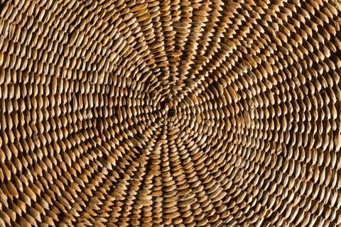 Rustic woven wicker grass mat spiral background Stock Photos