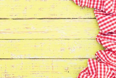 Rustic yellow wood table top background texture, with red tablecloth Foto stock