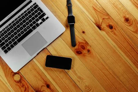 Rustik, worker, wooden table top view, flat. Business items on the table, lap Stock Photos
