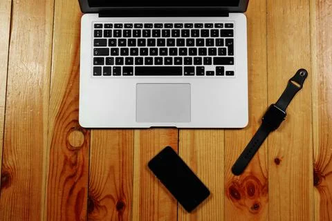 Rustik, worker, wooden table top view, flat. Business items on the table, lap Stock Photos