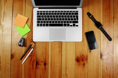 Rustik, worker, wooden table top view, flat. Business items on the table, lap Stock Photos