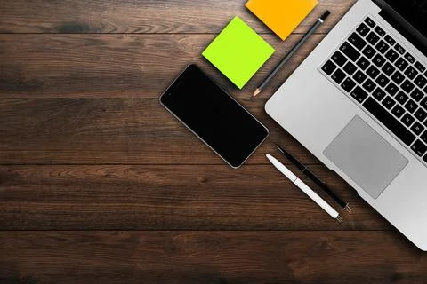 Rustik, worker, wooden table top view, flat. Business items on the table, lap Foto stock