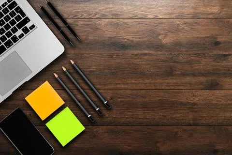 Rustik, worker, wooden table top view, flat. Business items on the table, lap Stock Photos