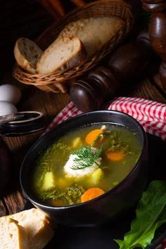 Rustikal Sorrel soup with potatoes and cream Rustikal Sorrel soup with pot... Stock Photos