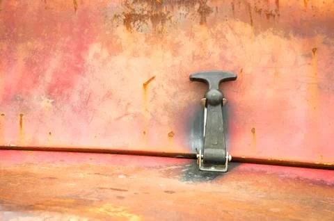 Rusting panel and latch Stock Photos