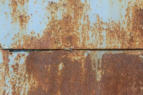 Rust.Old rusty metal background.An old blue metal wall with spots and streaks Stock Photos