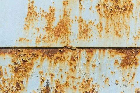 Rust.Old rusty metal background.An old blue metal wall with spots and streaks Stock Photos