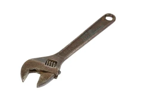 Rusty adjustable wrench on white background Stock Photos