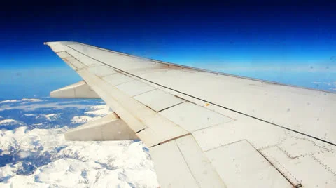 Rusty Airplane flying over Austrian alps Stockbeeldmateriaal 27135122
