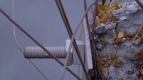Rusty Anchor Bolt On Electric Pole Base in Water Video stock 338342963