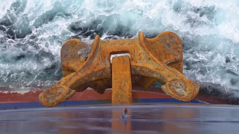 Rusty anchor of a cargo ship on a sea slow motion background Stock Footage 117162587