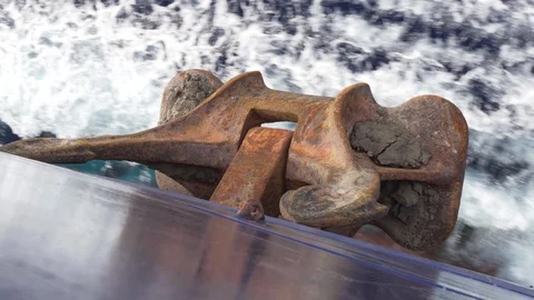 Rusty anchor of a modern cargo ship underway Stock Footage 120519190
