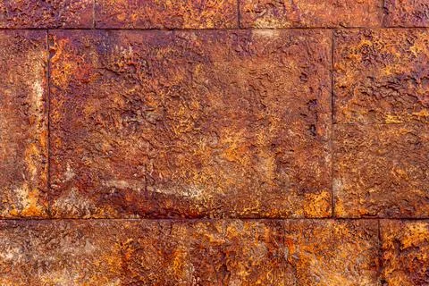 Rusty ancient stone brick wall close up textured background Stock Photos