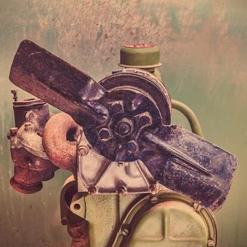 Rusty and weathered car engine motor block in front of a green metal backgrou Stock Illustration