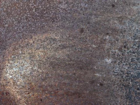 Rusty and worn surface of the iron plate Stock Photos