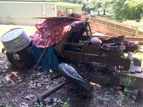 Rusty antique car in backyard Stock Photos