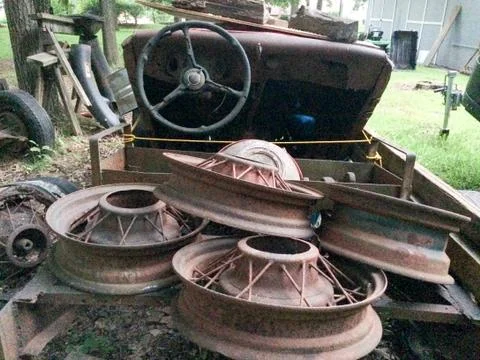 Rusty antique ford car Stock Photos