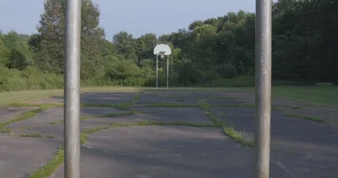Rusty Ball Hoop In Empty Basketball Court Vídeo Stock 92367368