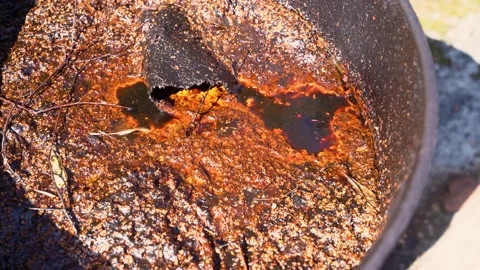 Rusty barrel containing oil, Concept of industrial pollution Stock Footage 150738344