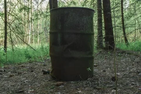 Rusty barrel in the forest Stock Photos